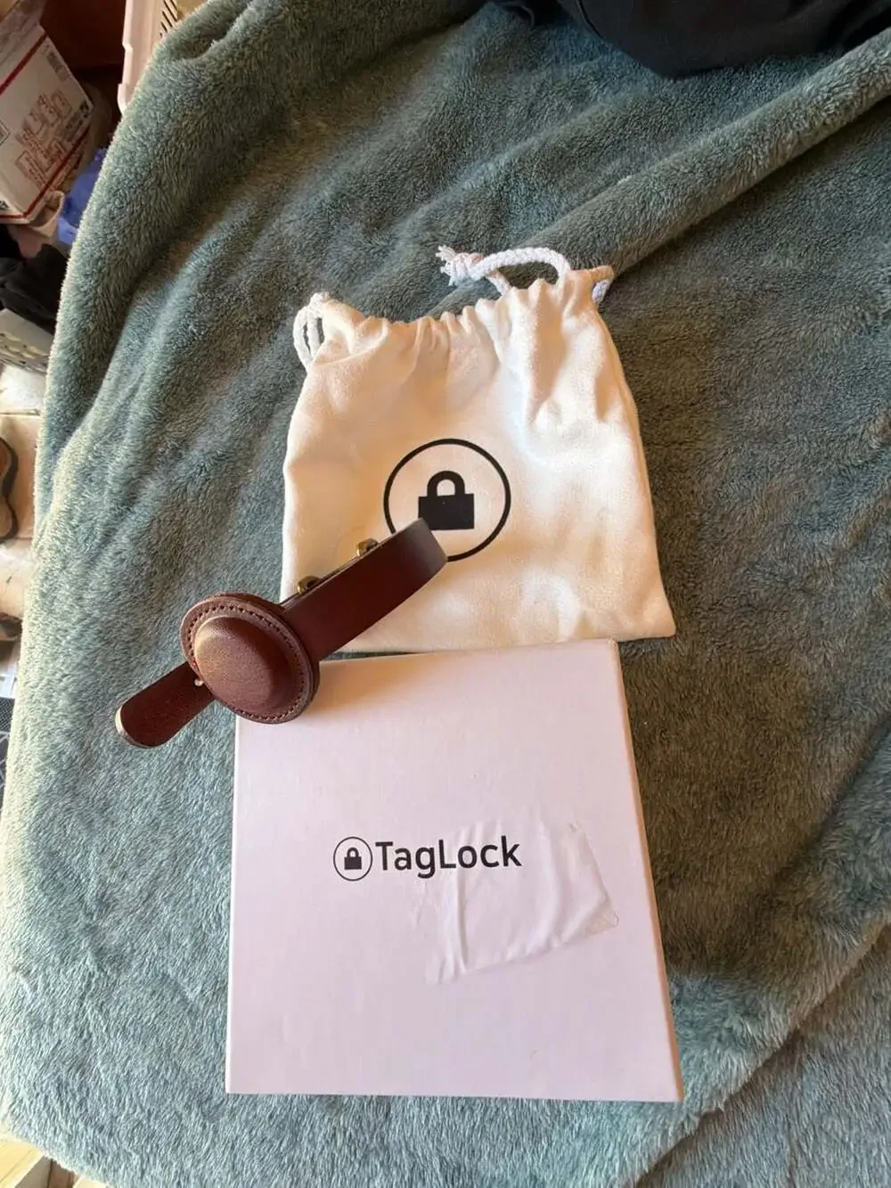 TagLock Leather AirTag Collar Holder Brown with a TrackR bravo device